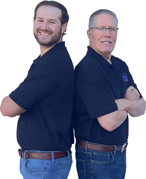Jim and Tate – Local Houston Home Buyers You Can Count On Jim and Tate standing back-to-back – trusted home buyers in Houston TX